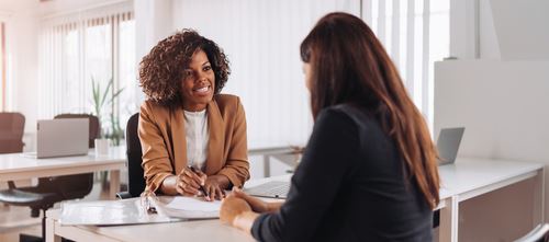 woman meeting with a lawyer