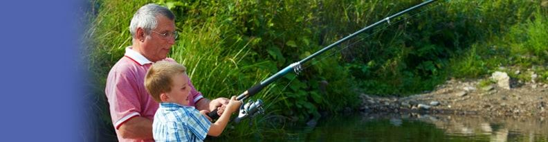 Grandparent and child fishing